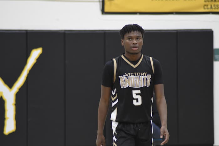 Victory Christian sophomore Jayden Gray awaits foul shots during Saturday's win over Francis Parker